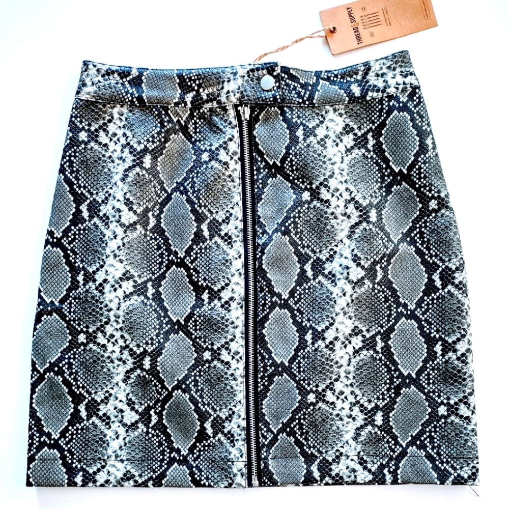 Cute short skirt. Black, grey, white color.